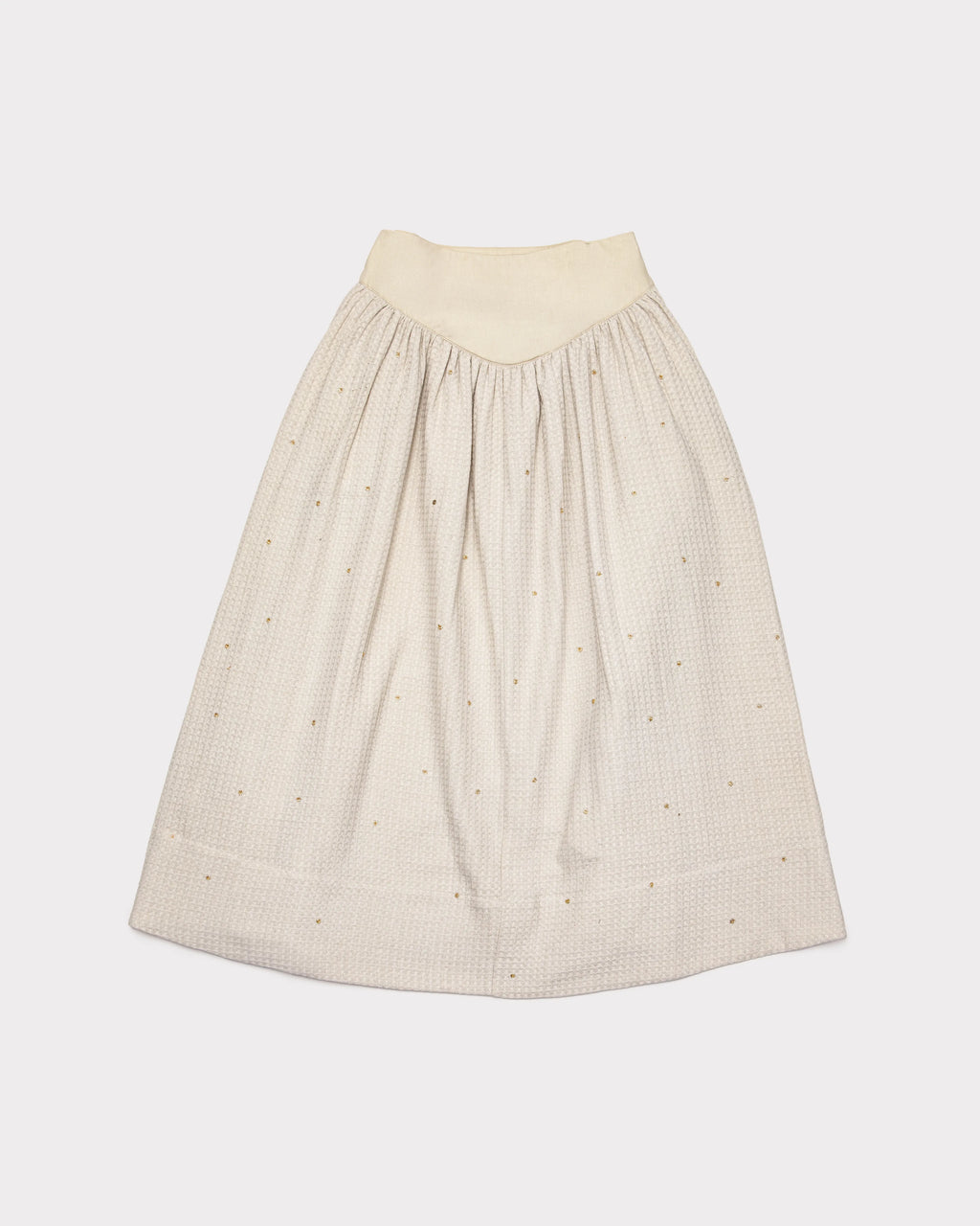 Vanilla Ice waffle skirt with subtle hand embroidered pattern on a white background