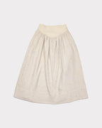 Vanilla Ice waffle skirt with subtle hand embroidered pattern on a white background