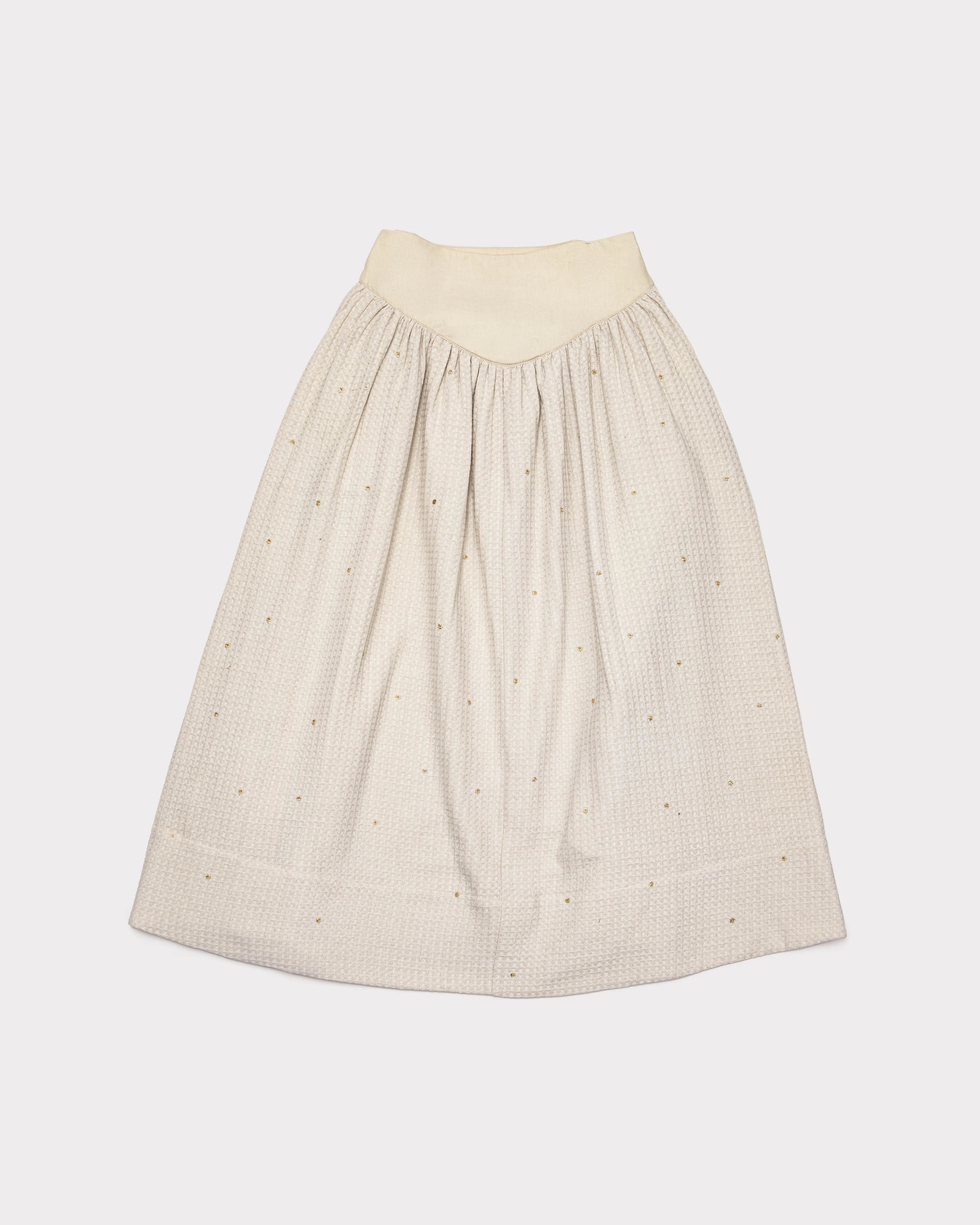 Vanilla Ice waffle skirt with subtle hand embroidered pattern on a white background